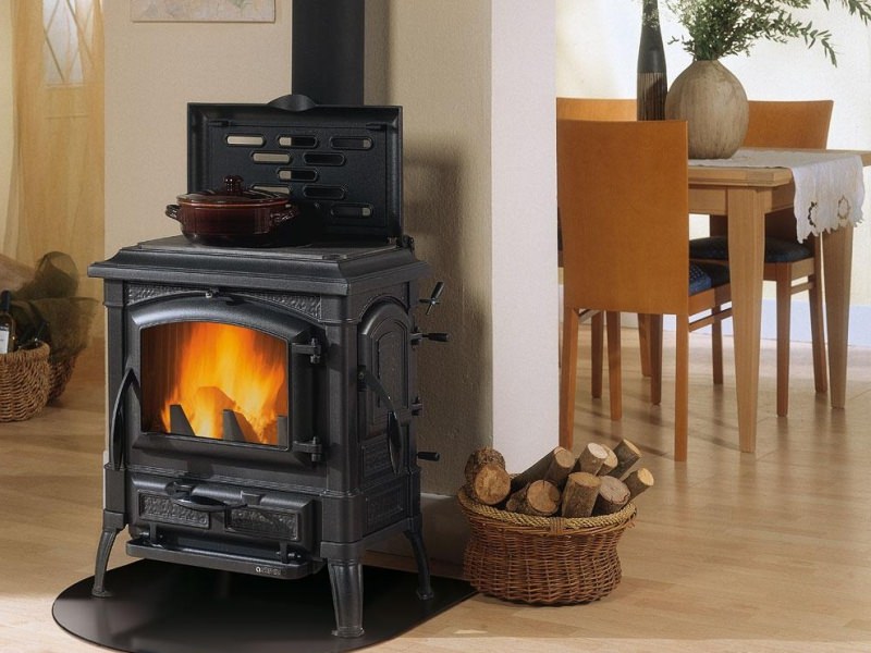 Современные отопительные печи, работающие на опилках